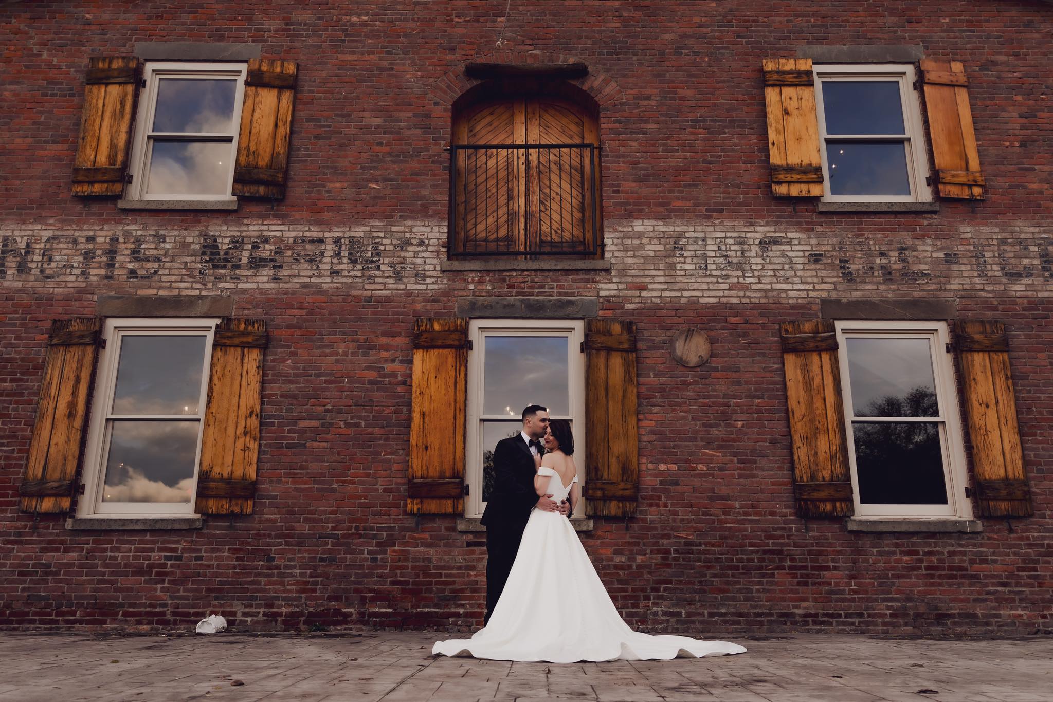 wedding exterior shot outside brick building